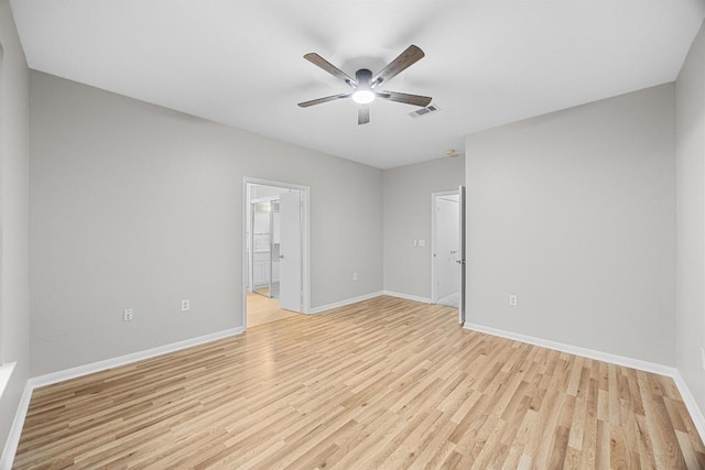 258 Whispering Wind Dr, Georgetown, TX 78633 - spare room with light wood finished floors, baseboards, and a ceiling fan
