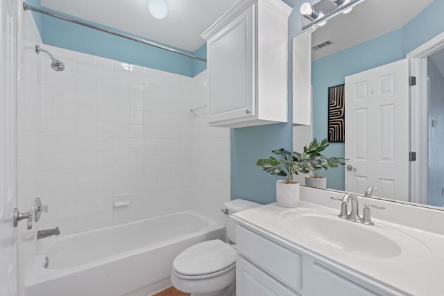 9013 Lantana Way, Austin, TX 78749 - bathroom with tub / shower combination, toilet, and vanity