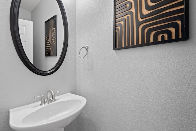 9013 Lantana Way, Austin, TX 78749 - bathroom with a sink and a textured wall