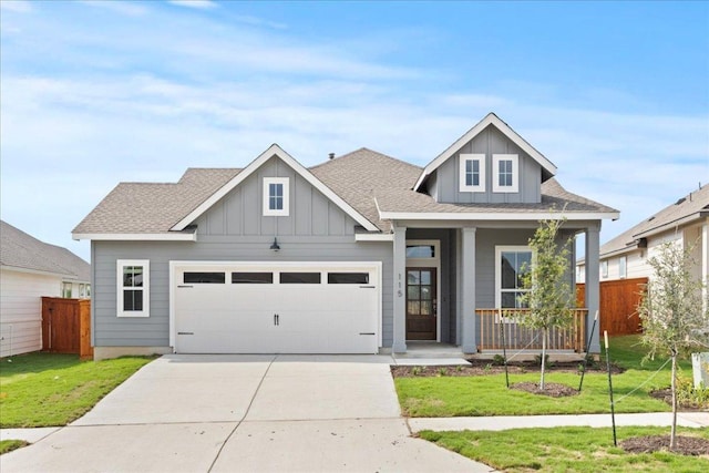 115 Paul Pena Dr, San Marcos, TX 78666 - craftsman inspired home with a porch, board and batten siding, concrete driveway, a garage, and roof with shingles