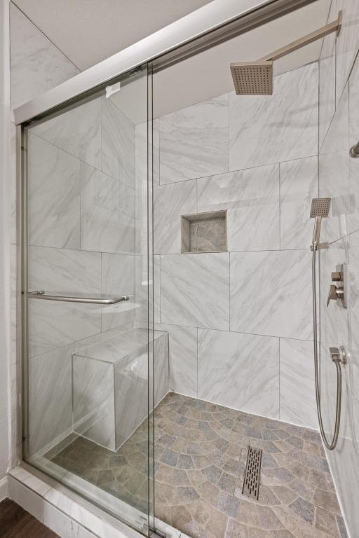 7516 Marble Crest Dr, Austin, TX 78747 - bathroom with a stall shower