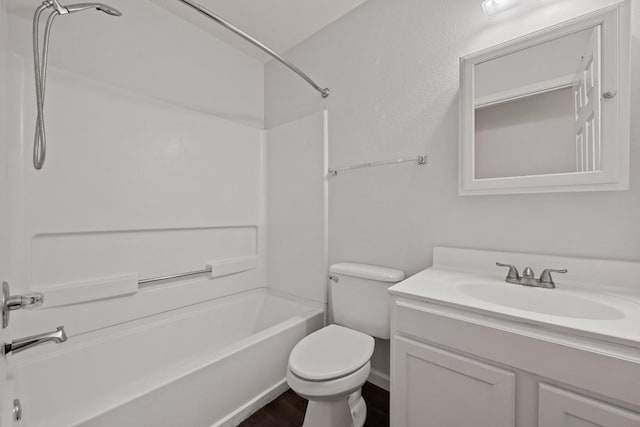 7516 Marble Crest Dr, Austin, TX 78747 - full bathroom featuring shower / washtub combination, toilet, vanity, and wood finished floors