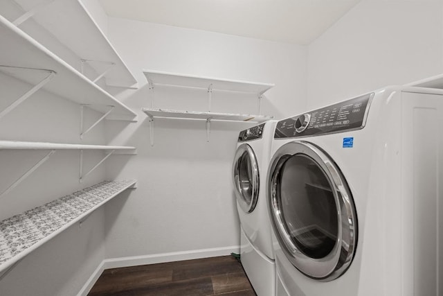 7516 Marble Crest Dr, Austin, TX 78747 - laundry area with dark wood-type flooring, independent washer and dryer, and baseboards