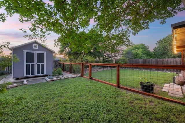 7516 Marble Crest Dr, Austin, TX 78747 - view of yard featuring a storage unit and an outdoor structure