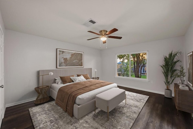 7516 Marble Crest Dr, Austin, TX 78747 - bedroom featuring dark wood finished floors, baseboards, and ceiling fan
