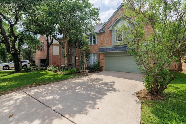 2113 Spring Hollow Path, Round Rock, TX 78681 - view of front of home featuring concrete driveway, brick siding, an attached garage, and a front lawn