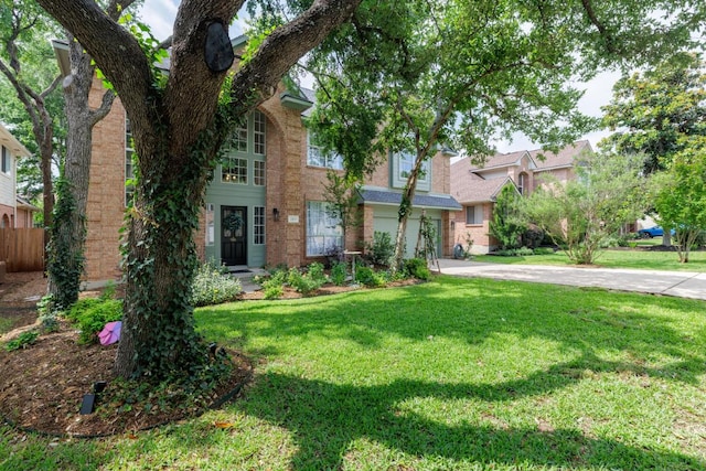 2113 Spring Hollow Path, Round Rock, TX 78681 - view of front of property featuring concrete driveway, a garage, and brick siding