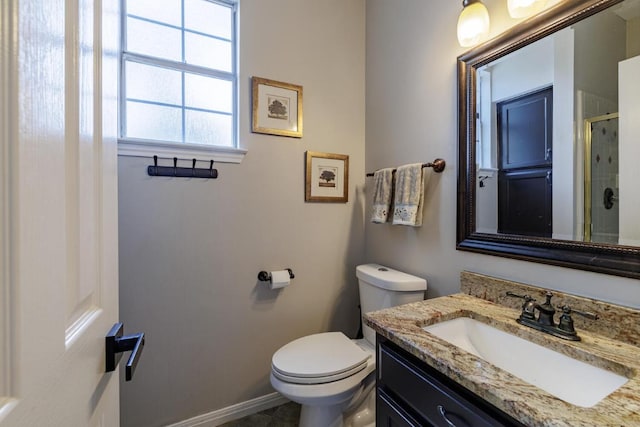 2113 Spring Hollow Path, Round Rock, TX 78681 - full bathroom with a shower stall, toilet, vanity, and baseboards