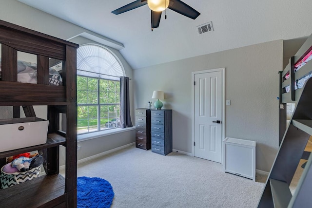 2113 Spring Hollow Path, Round Rock, TX 78681 - bedroom with lofted ceiling, carpet flooring, baseboards, and ceiling fan