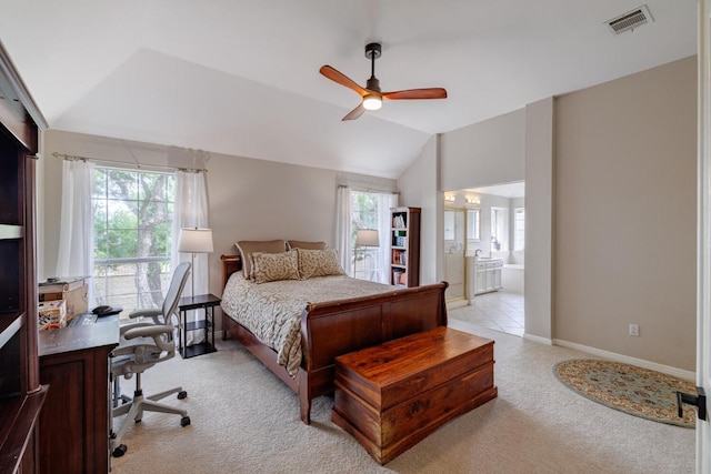2113 Spring Hollow Path, Round Rock, TX 78681 - bedroom with light carpet, multiple windows, an office area, lofted ceiling, and ensuite bathroom