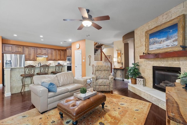 4332 Teravista Club Dr Unit 69, Round Rock, TX 78665 - living room featuring a ceiling fan, stairs, wood finished floors, baseboards, and recessed lighting