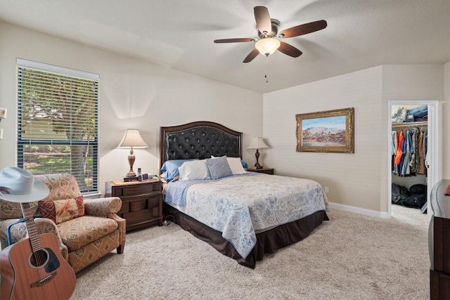 4332 Teravista Club Dr Unit 69, Round Rock, TX 78665 - carpeted bedroom featuring a walk in closet, a ceiling fan, a closet, and baseboards