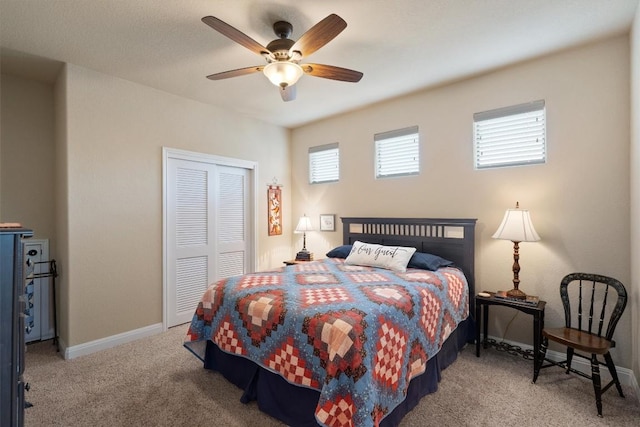 4332 Teravista Club Dr Unit 69, Round Rock, TX 78665 - carpeted bedroom with a closet, baseboards, and a ceiling fan