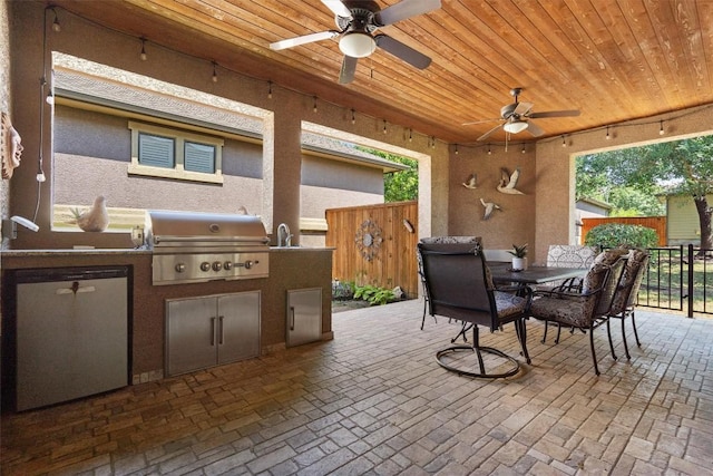 4332 Teravista Club Dr Unit 69, Round Rock, TX 78665 - view of patio / terrace with a ceiling fan, outdoor dining space, and a sink