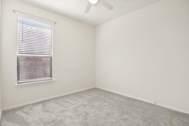 212 Mauldin St, Georgetown, TX 78628 - carpeted spare room with ceiling fan and baseboards