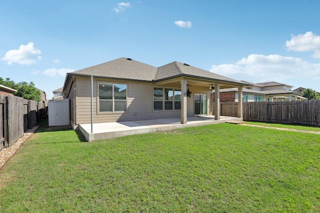 212 Mauldin St, Georgetown, TX 78628 - back of property with a patio, a storage shed, and an outdoor structure