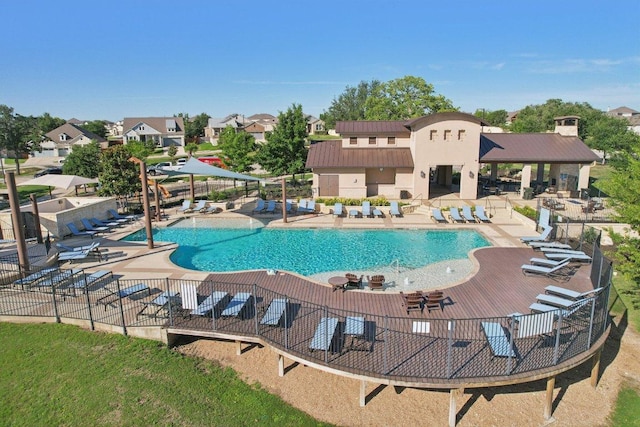 212 Mauldin St, Georgetown, TX 78628 - community pool featuring a patio, fence, and a residential view
