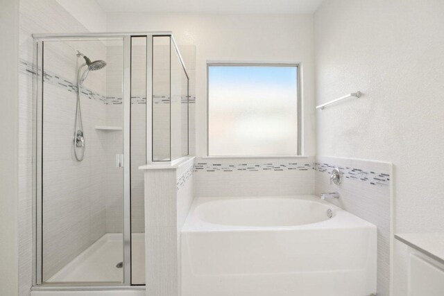 212 Mauldin St, Georgetown, TX 78628 - full bathroom featuring a shower stall, a bath, and vanity