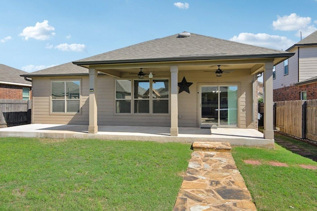 212 Mauldin St, Georgetown, TX 78628 - rear view of house featuring ceiling fan, a patio area, and a shingled roof