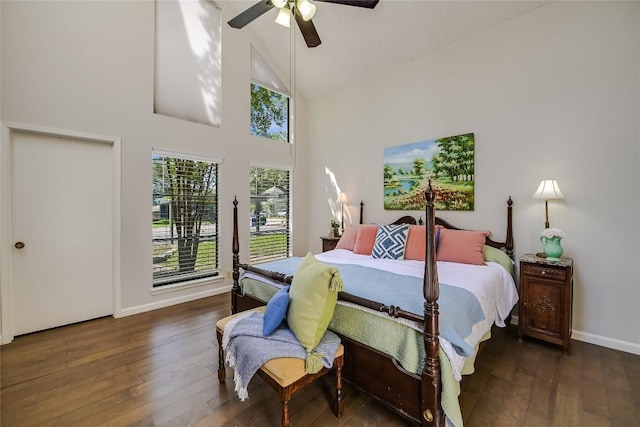 15 Casa Verde Dr, Lakeway, TX 78734 - bedroom with high vaulted ceiling, hardwood / wood-style floors, baseboards, and ceiling fan