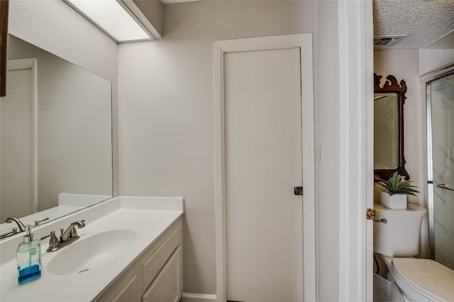 15 Casa Verde Dr, Lakeway, TX 78734 - bathroom featuring vanity and toilet