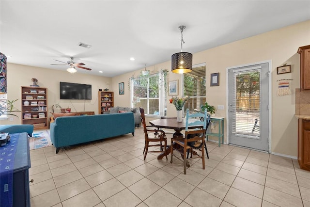 5228 Bantom Woods Bnd, Austin, TX 78724 - dining space featuring plenty of natural light, light tile patterned floors, a ceiling fan, and recessed lighting