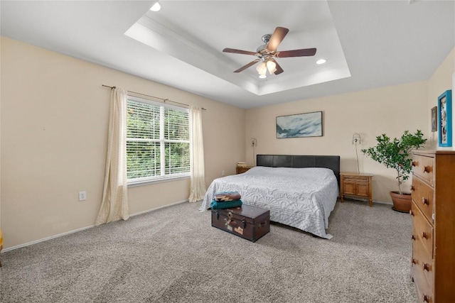 5228 Bantom Woods Bnd, Austin, TX 78724 - carpeted bedroom with a tray ceiling, recessed lighting, a ceiling fan, and baseboards