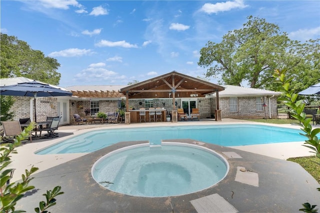 240 2 Mile Ln, Smithville, TX 78957 - view of swimming pool with a patio and a pool with connected hot tub
