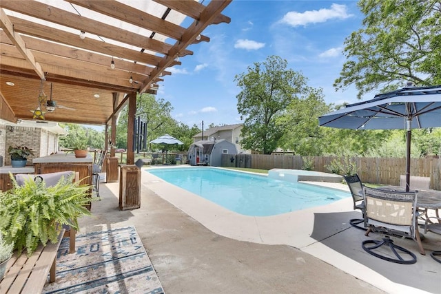 240 2 Mile Ln, Smithville, TX 78957 - view of pool featuring a fenced backyard, a storage shed, a patio, an outdoor structure, and a pergola