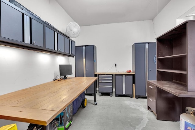 office area with concrete flooring