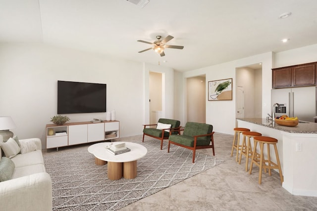 living room with ceiling fan