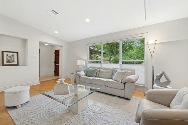 3000 Greenlawn Pkwy, Austin, TX 78757 - living room with vaulted ceiling, light wood finished floors, recessed lighting, and baseboards