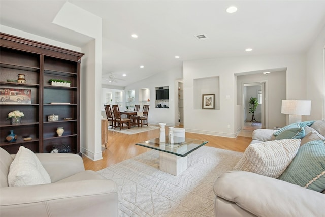 3000 Greenlawn Pkwy, Austin, TX 78757 - living area featuring light wood-type flooring, recessed lighting, vaulted ceiling, and baseboards