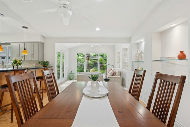3000 Greenlawn Pkwy, Austin, TX 78757 - dining room featuring a ceiling fan, vaulted ceiling, light wood-type flooring, baseboards, and recessed lighting