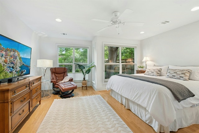 3000 Greenlawn Pkwy, Austin, TX 78757 - bedroom featuring ceiling fan, light wood-style floors, and recessed lighting