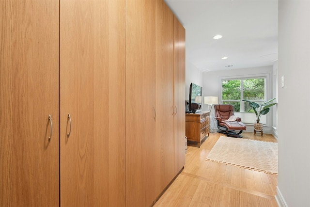 3000 Greenlawn Pkwy, Austin, TX 78757 - hallway with light wood-style flooring and recessed lighting