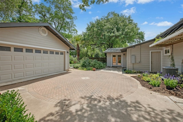 3000 Greenlawn Pkwy, Austin, TX 78757 - garage with french doors and central AC