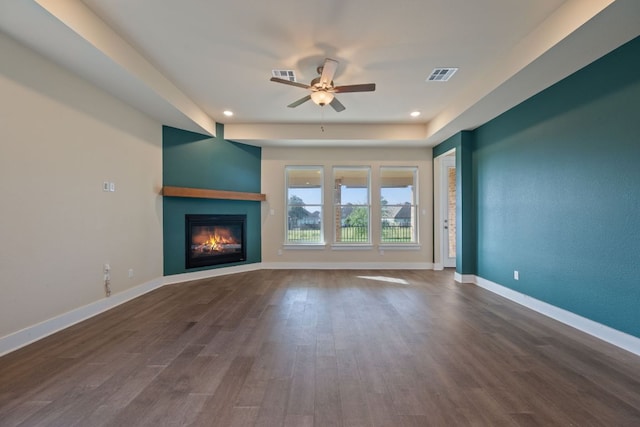 159 Nodena Dr, Dripping Springs, TX 78620 - unfurnished living room featuring ceiling fan, a fireplace, wood finished floors, baseboards, and recessed lighting