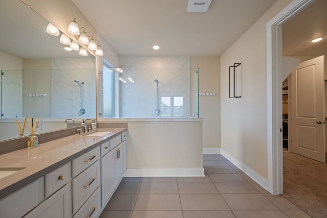 159 Nodena Dr, Dripping Springs, TX 78620 - full bath featuring walk in shower, baseboards, tile patterned floors, double vanity, and recessed lighting