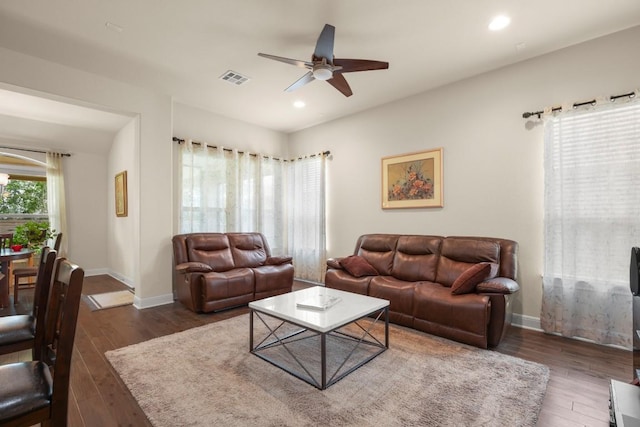 living room with ceiling fan, wood finished floors, recessed lighting, and baseboards