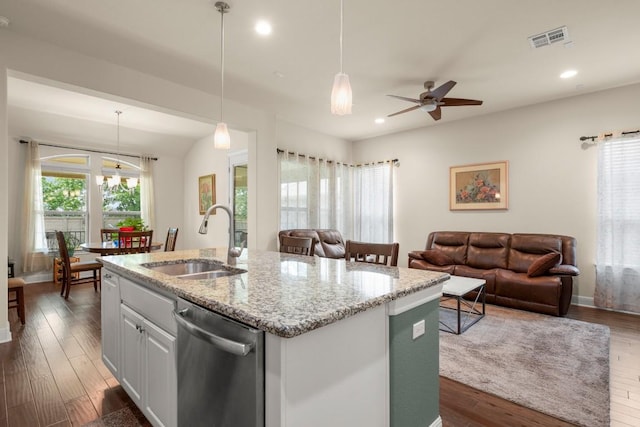kitchen with a sink, dishwasher, open floor plan, an island with sink, and recessed lighting