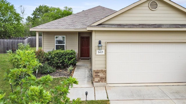 1413 Coffee Tree Dr, New Braunfels, TX 78130 - view of front of property featuring a shingled roof, fence, driveway, and an attached garage