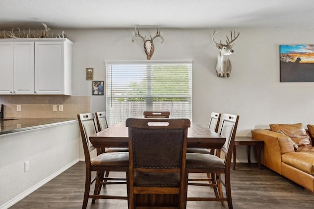 1413 Coffee Tree Dr, New Braunfels, TX 78130 - dining room with dark wood-style floors and baseboards