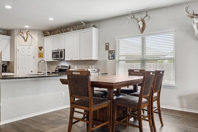 1413 Coffee Tree Dr, New Braunfels, TX 78130 - dining room with dark wood finished floors, recessed lighting, and baseboards