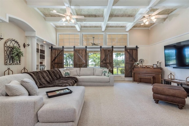 17270 Fm 112, Thrall, TX 76578 - living area featuring ceiling fan, coffered ceiling, a barn door, beam ceiling, and a towering ceiling