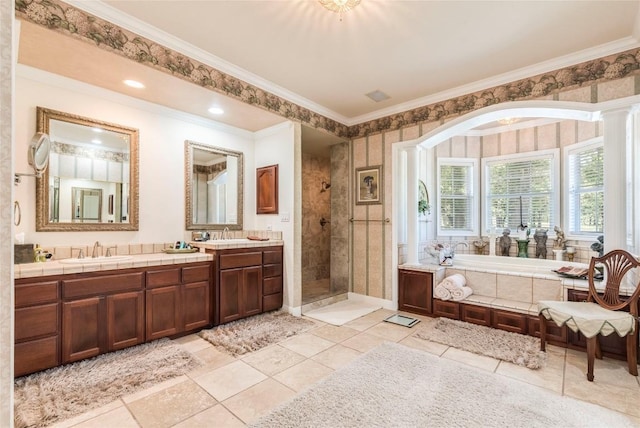 17270 Fm 112, Thrall, TX 76578 - full bathroom featuring crown molding, a bath, a shower stall, double vanity, and tile patterned flooring