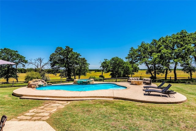 17270 Fm 112, Thrall, TX 76578 - view of pool featuring a patio, a pool with connected hot tub, and an outdoor fire pit