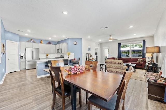 dining room with light wood-style floors, recessed lighting, ceiling fan, and baseboards
