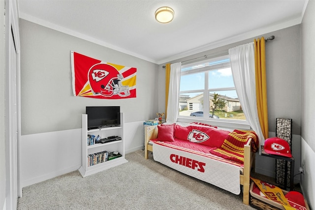 bedroom featuring carpet floors and baseboards