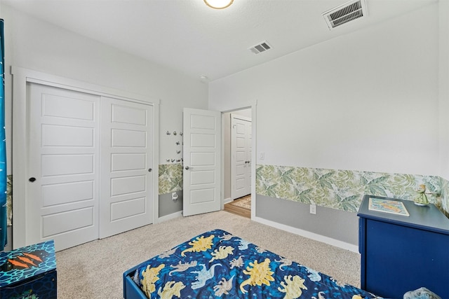 144 Shawii Pass, Leander, TX 78641 - bedroom with carpet floors, a closet, and baseboards